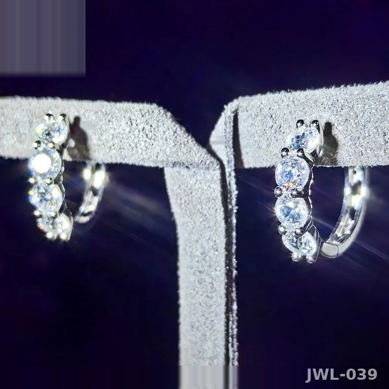 Iced Out Huggie Hoop Earrings · Rhodium · 925 Silver · VVS Moissanite