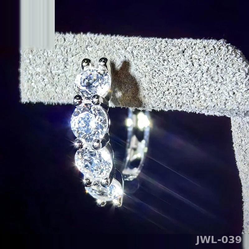Iced Out Huggie Hoop Earrings · Rhodium · 925 Silver · VVS Moissanite