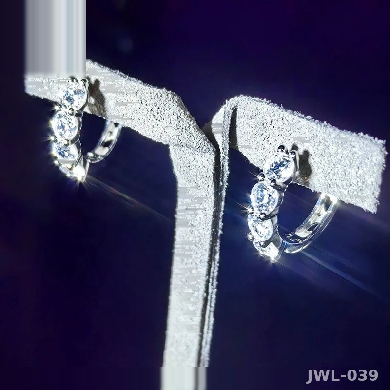 Iced Out Huggie Hoop Earrings · Rhodium · 925 Silver · VVS Moissanite